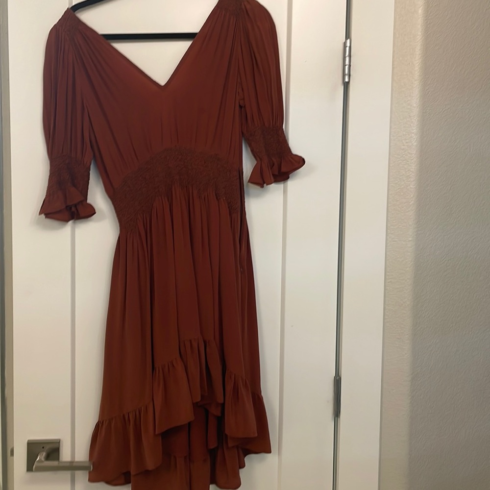 Love Sam dress- burnt orange color: silk material, small mark on chest area.